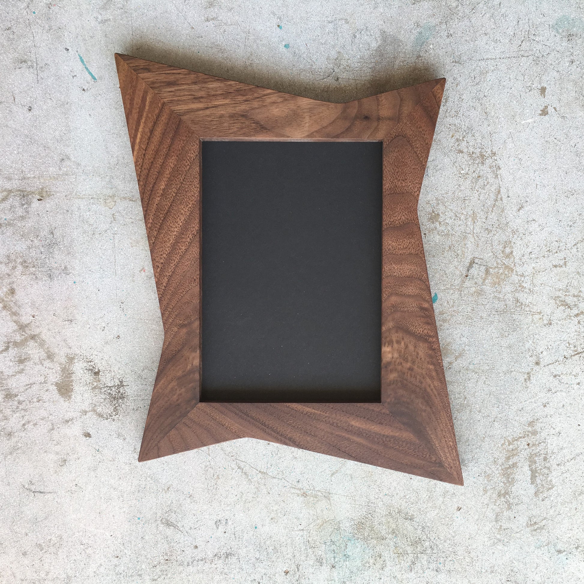Walnut mid century modern inspired atomic frame.